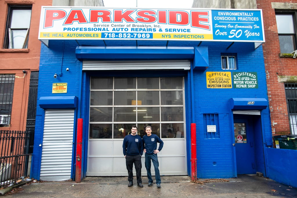 Charlie & Charlie standing outside the Parkside Auto Care storefront on Union Street, Brooklyn